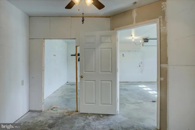 a view of a porch with wooden floor