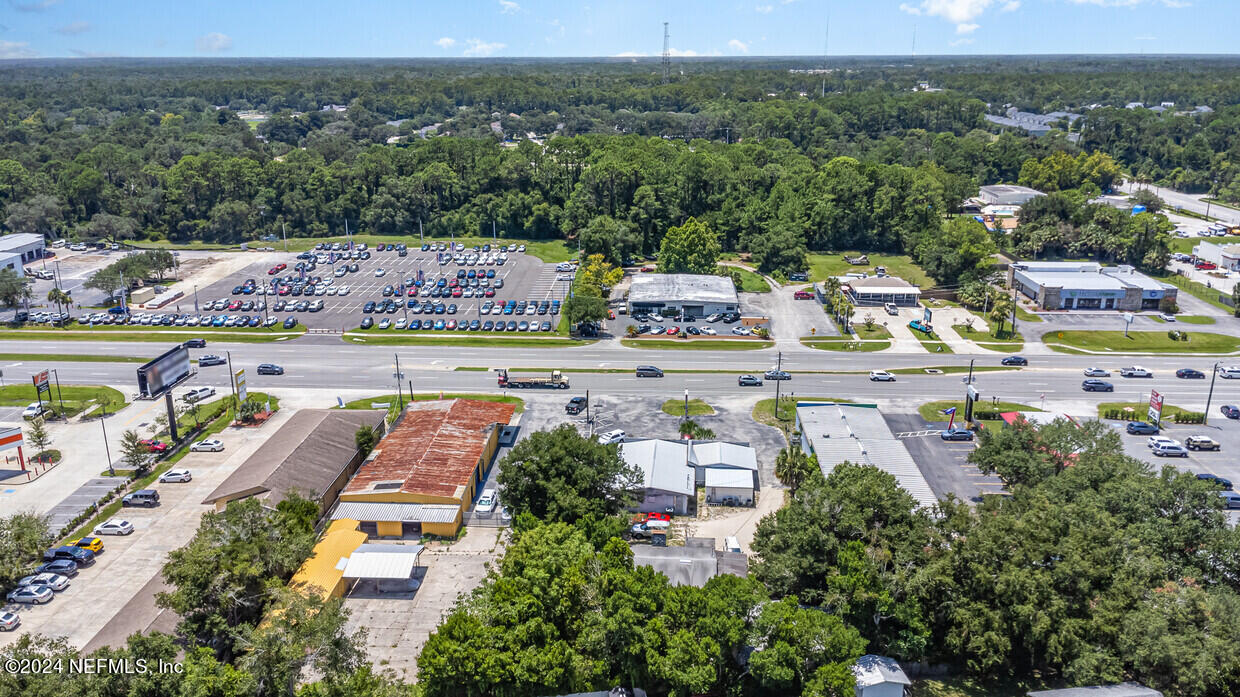 2570 Highway 1 St. Augustine, FL 32086 - Photo 8 of 12 an aerial view of residential houses with outdoor space and trees