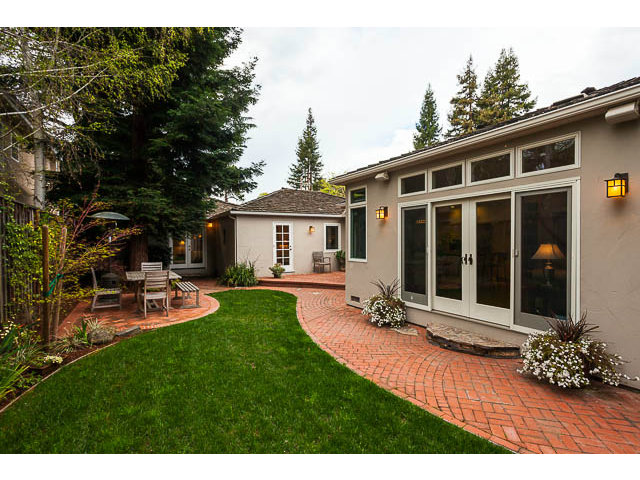 145 Cornell Road Menlo Park, CA 94025 - Photo 14 of 14 a view of a house with backyard sitting area and garden