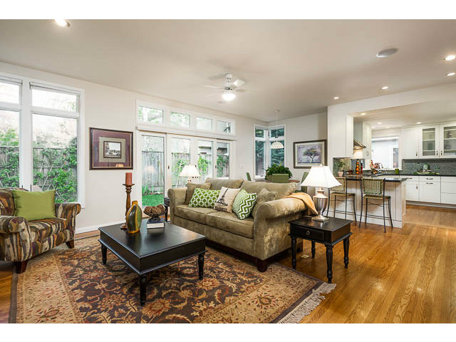 145 Cornell Road Menlo Park, CA 94025 - Photo 2 of 14 a living room with furniture a table and a large window
