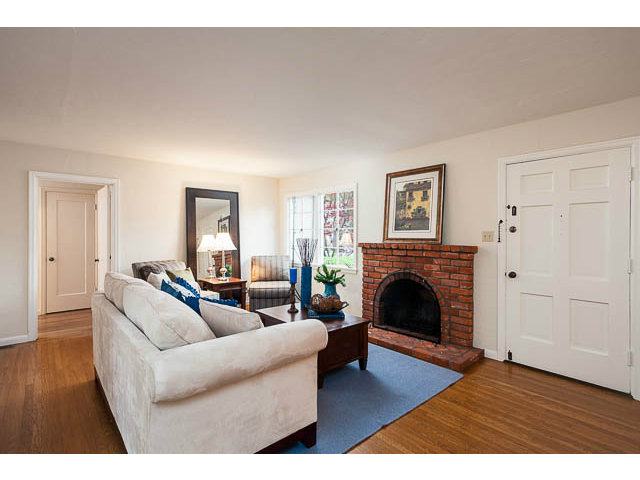 145 Cornell Road Menlo Park, CA 94025 - Photo 5 of 14 a living room with furniture and a fireplace