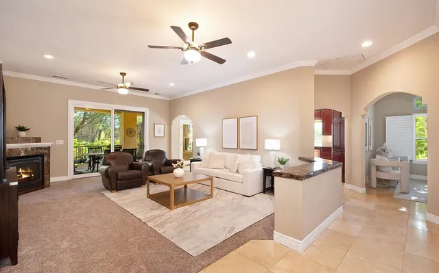 a kitchen with stainless steel appliances granite countertop a sink and stove