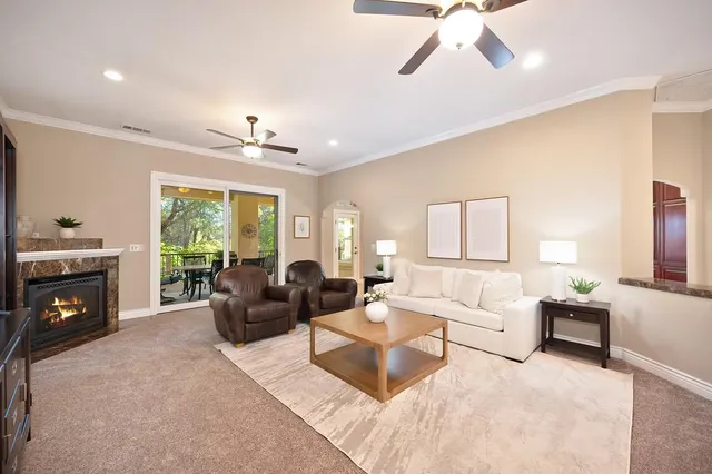 a kitchen with stainless steel appliances granite countertop a stove and cabinets
