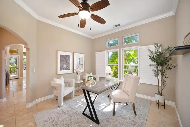 a kitchen with stainless steel appliances granite countertop a refrigerator and a stove