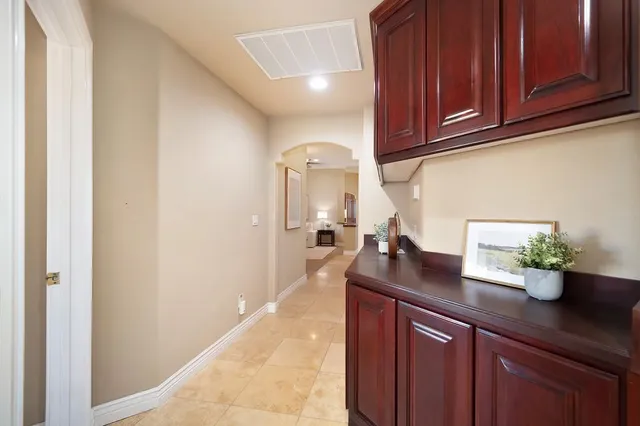 a view of storage and utility room with washer and dryer