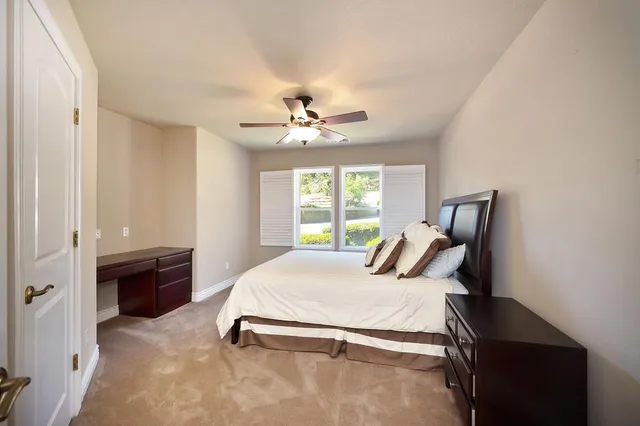 a view of a chairs and table in the patio