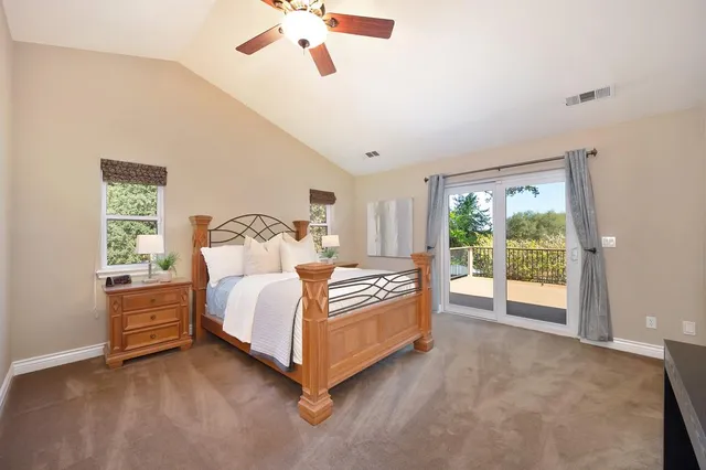 a backyard of a house with lots of green space