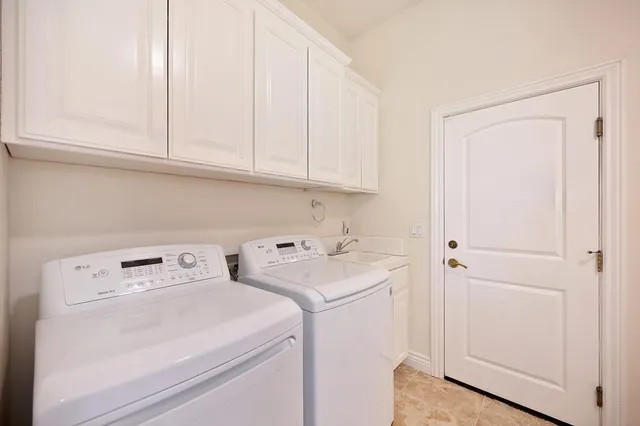 an aerial view of residential house and green space