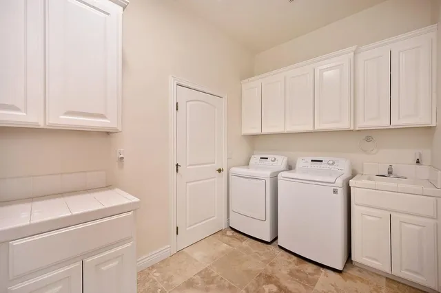 an aerial view of a city with lots of residential buildings