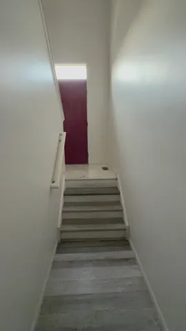 a bathroom with a sink a mirror and a vanity