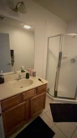 a view of living room kitchen with furniture and a fireplace