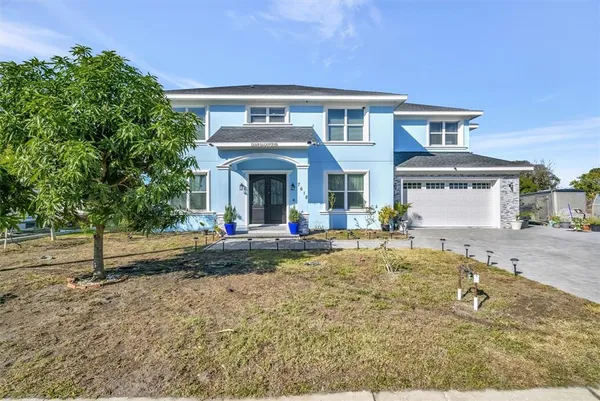 a view of house with outdoor space