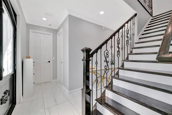 a bathroom with a sink a vanity a shower and a mirror