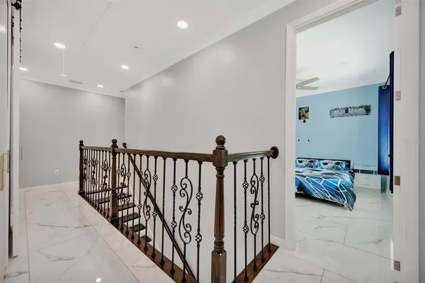 a bathroom with a double vanity sink a mirror and shower