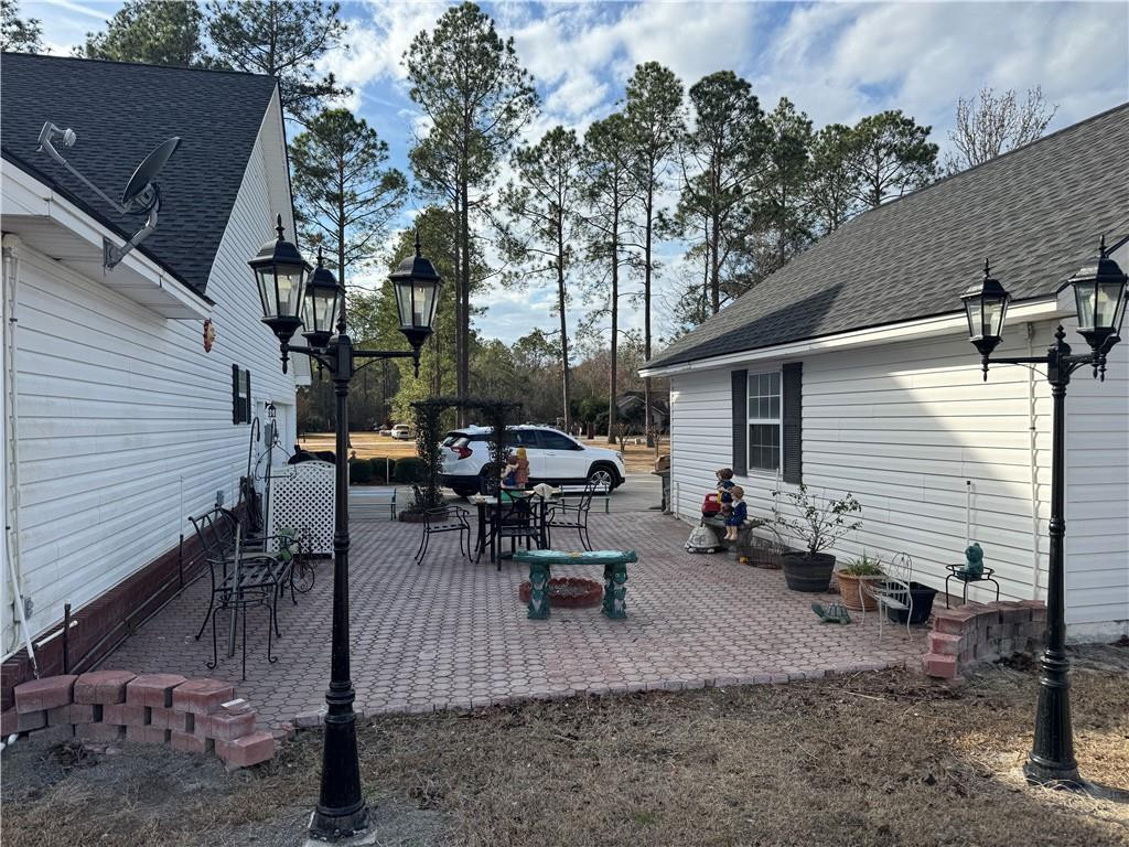 5710 Wooddell Ridge Road Waycross, GA 31503 - Photo 34 of 35 Courtyard patio-back view