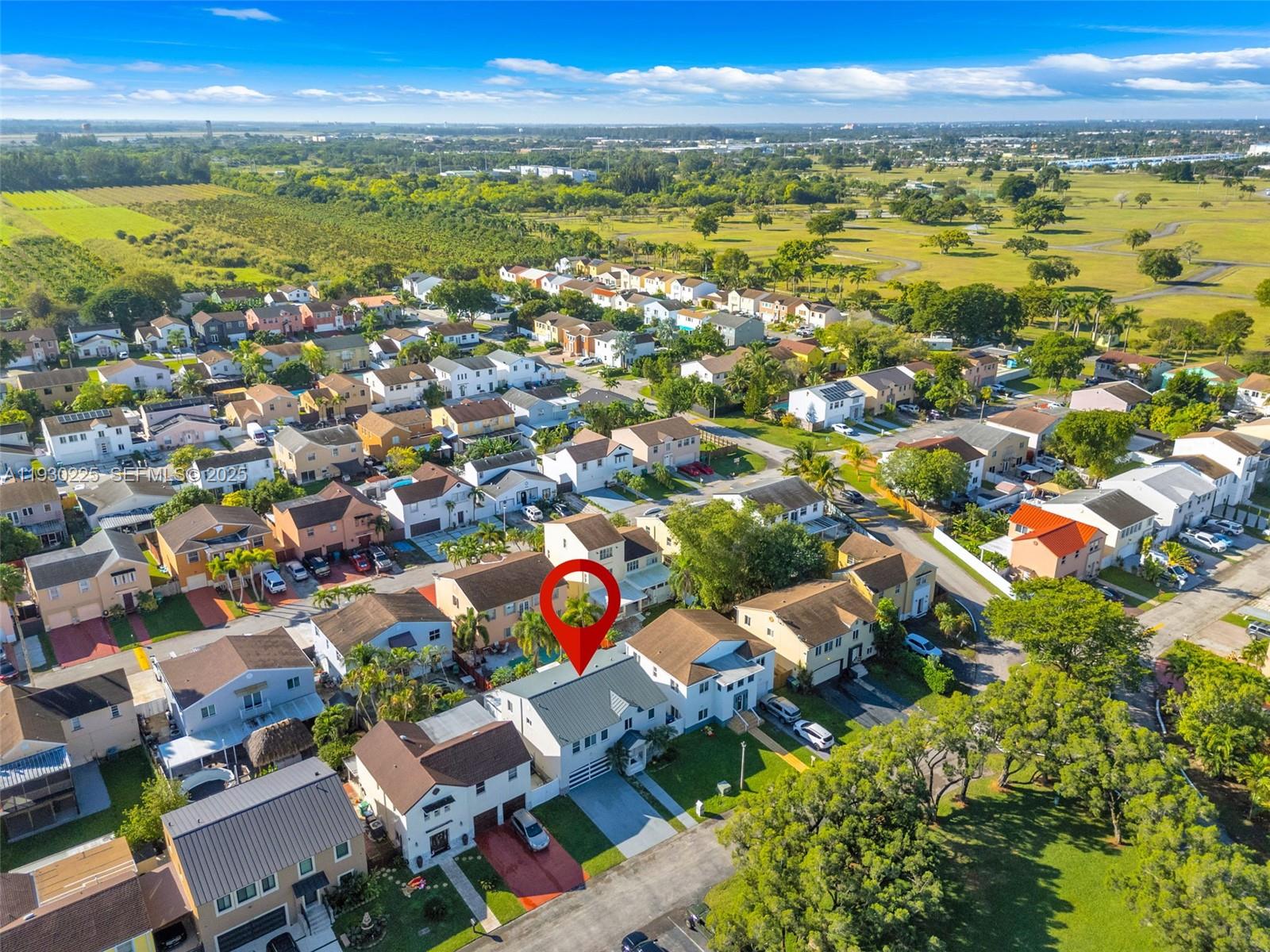 11966 Southwest 271st Street Homestead, FL 33032 - Photo 38 of 41 an aerial view of residential houses with outdoor space