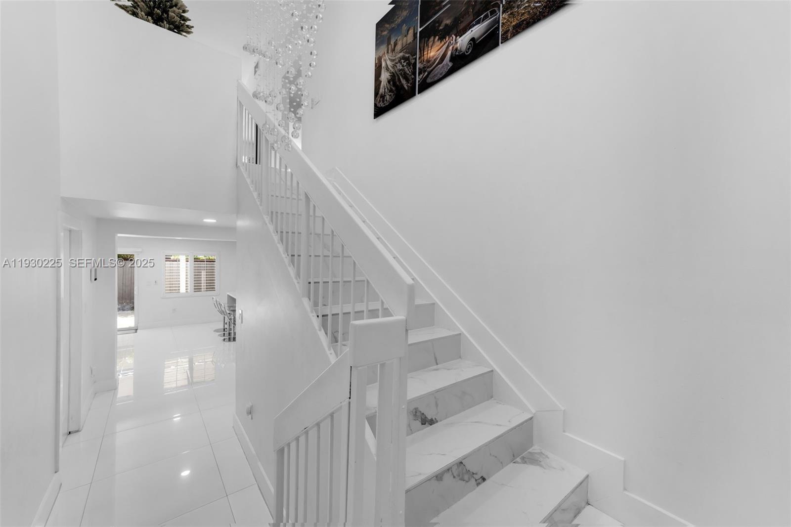 11966 Southwest 271st Street Homestead, FL 33032 - Photo 4 of 41 a view of entryway and hall with a front door