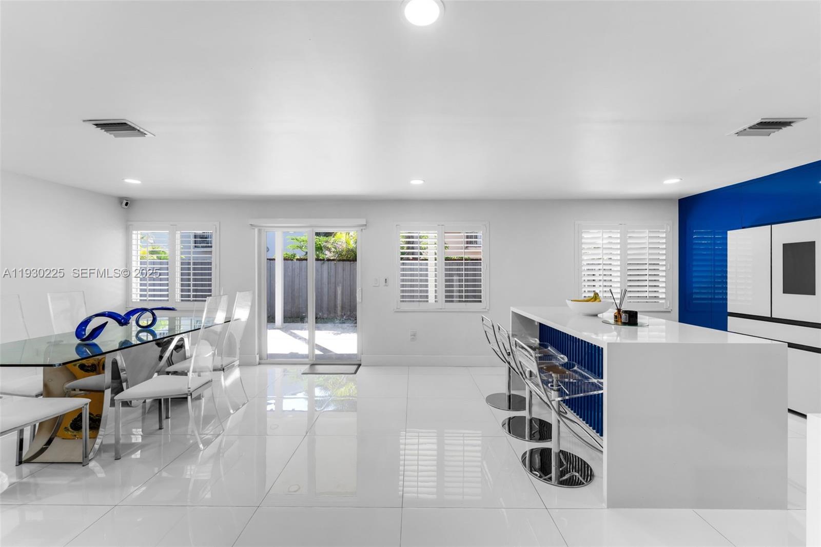 11966 Southwest 271st Street Homestead, FL 33032 - Photo 7 of 41 a living room with furniture and windows
