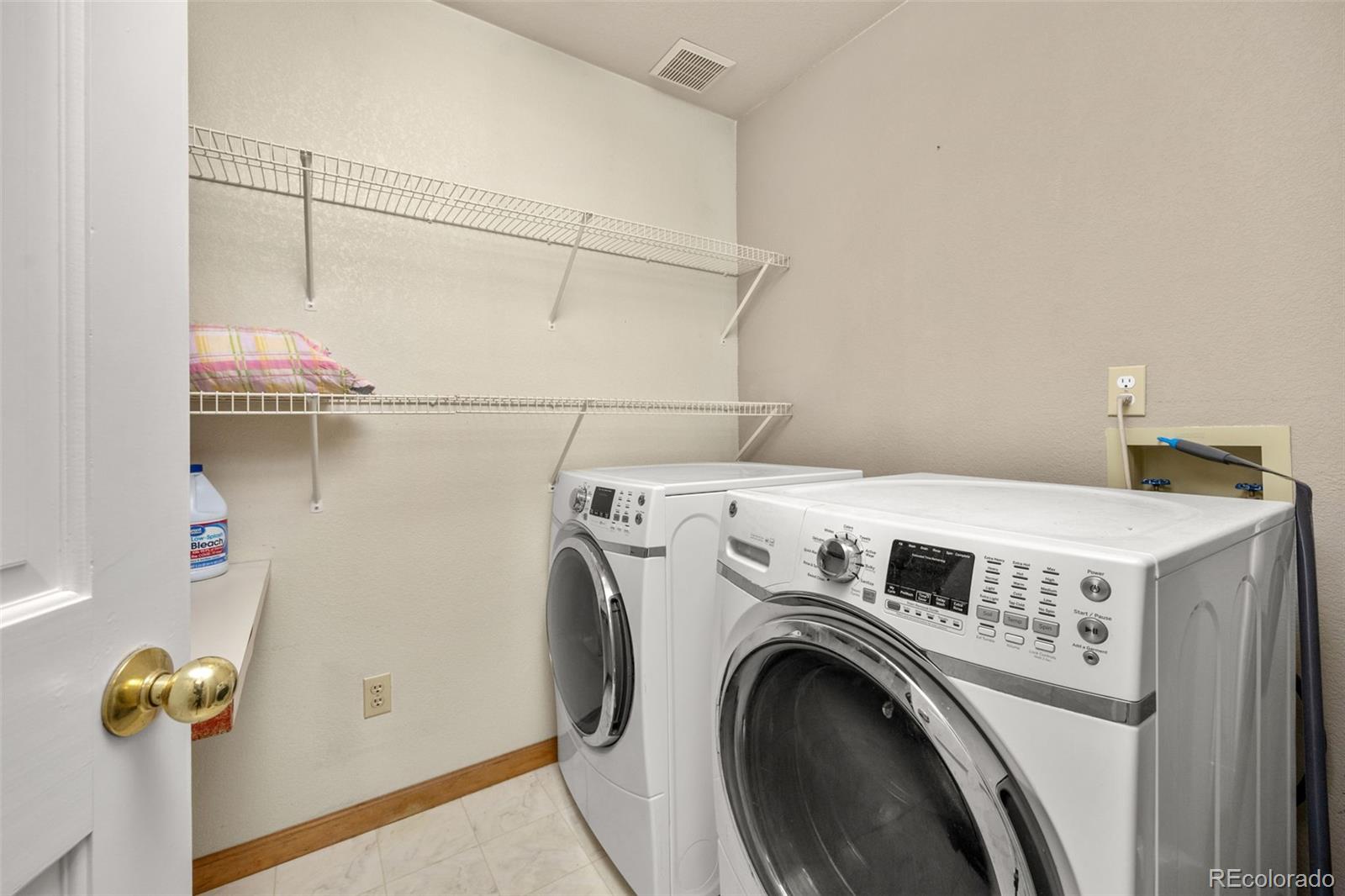 6868 Johnson Street Arvada, CO 80004 - Photo 13 of 39 a utility room with dryer and washer
