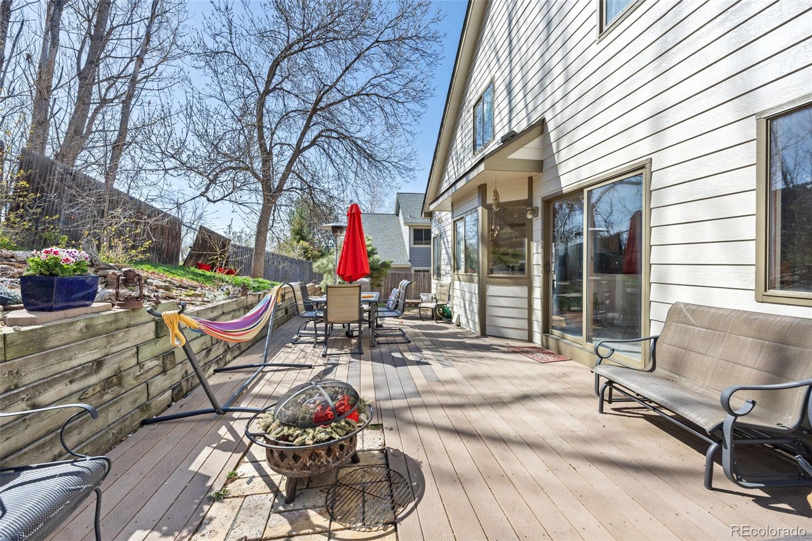 6868 Johnson Street Arvada, CO 80004 - Photo 26 of 39 a view of outdoor space yard deck patio and couch