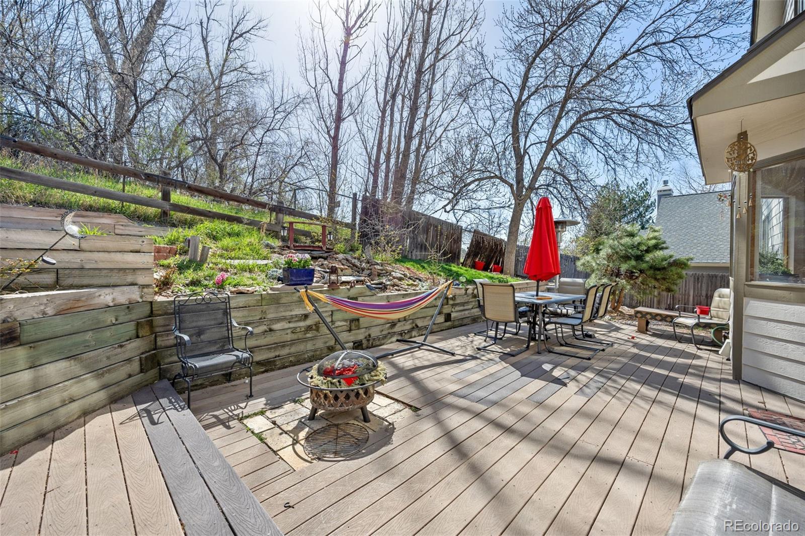 6868 Johnson Street Arvada, CO 80004 - Photo 27 of 39 a view of outdoor space yard and deck