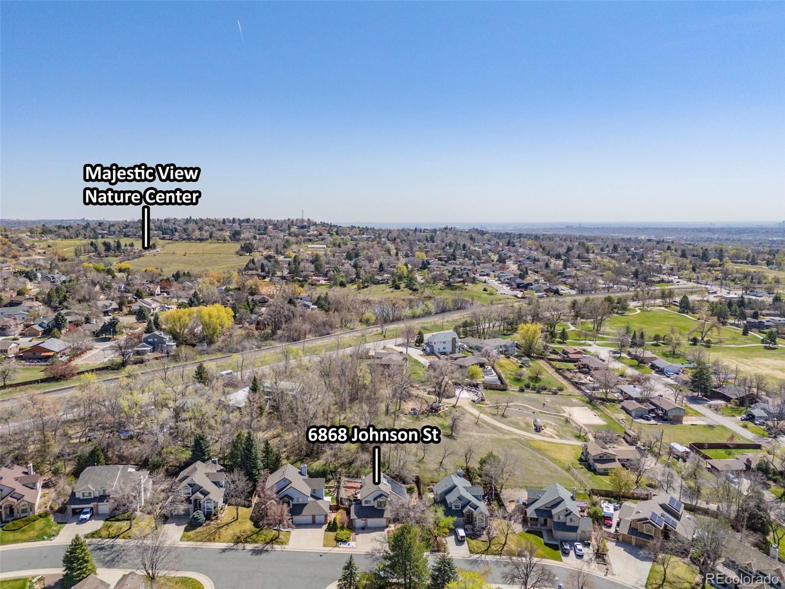 6868 Johnson Street Arvada, CO 80004 - Photo 34 of 39 an aerial view of a city