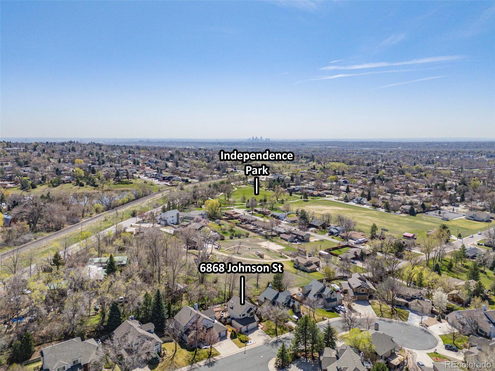 6868 Johnson Street Arvada, CO 80004 - Photo 35 of 39 an aerial view of a city