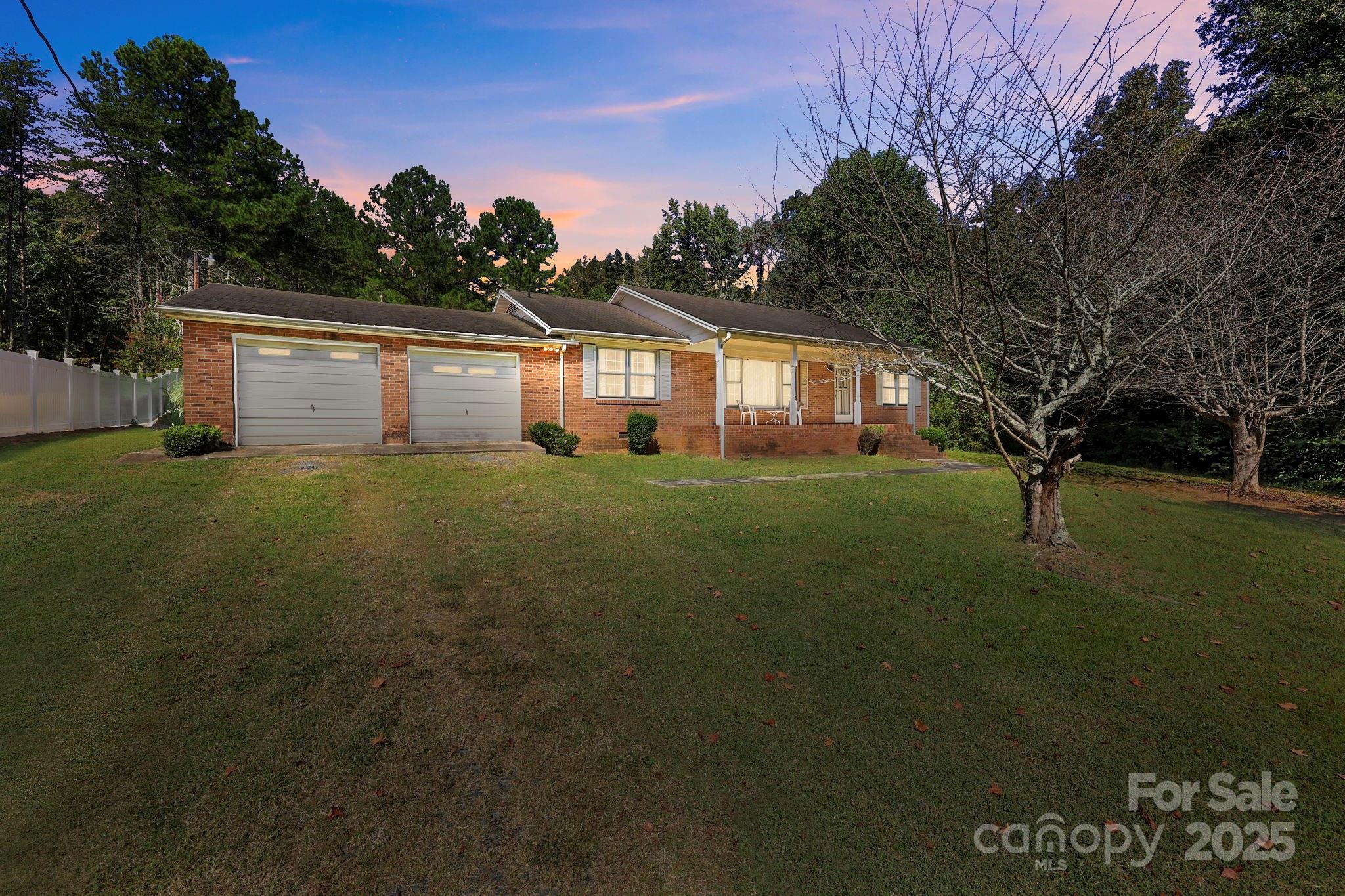 2440 Emanuel Church Road Rockwell, NC 28138 - Photo 1 of 41 a view of a house with a big yard