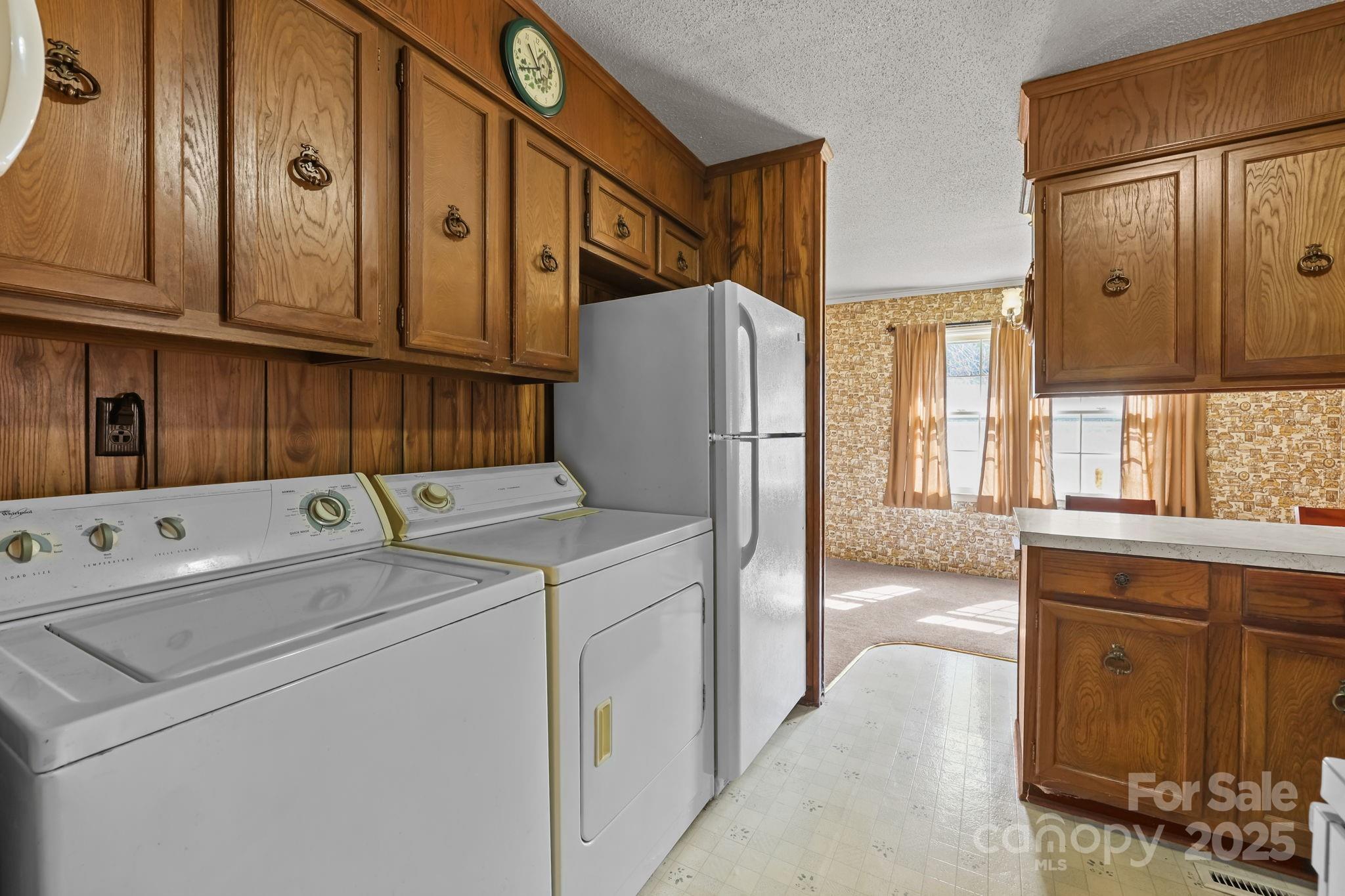 2440 Emanuel Church Road Rockwell, NC 28138 - Photo 15 of 41 a utility room with dryer and washer