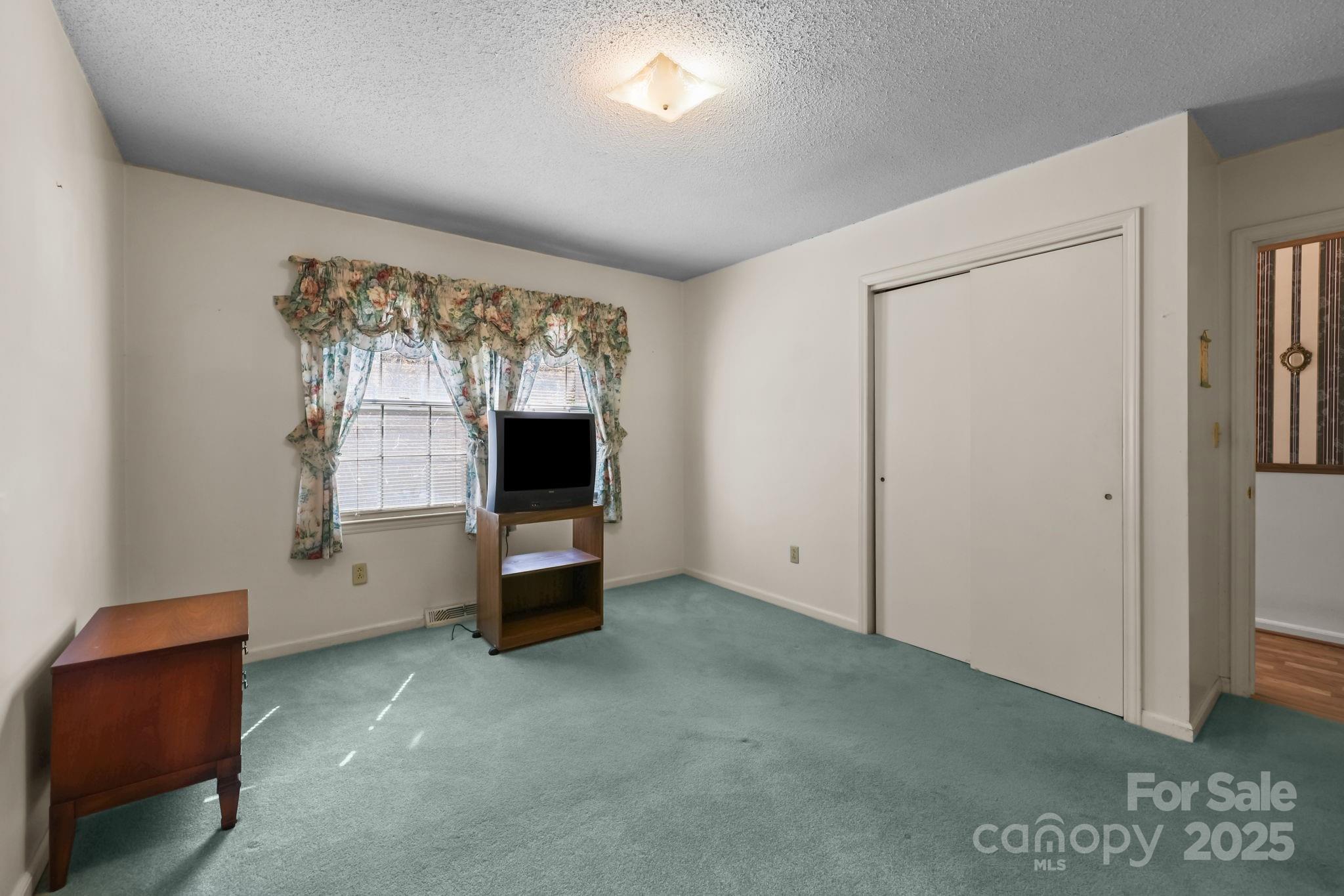 2440 Emanuel Church Road Rockwell, NC 28138 - Photo 26 of 41 a view of an empty room with a window