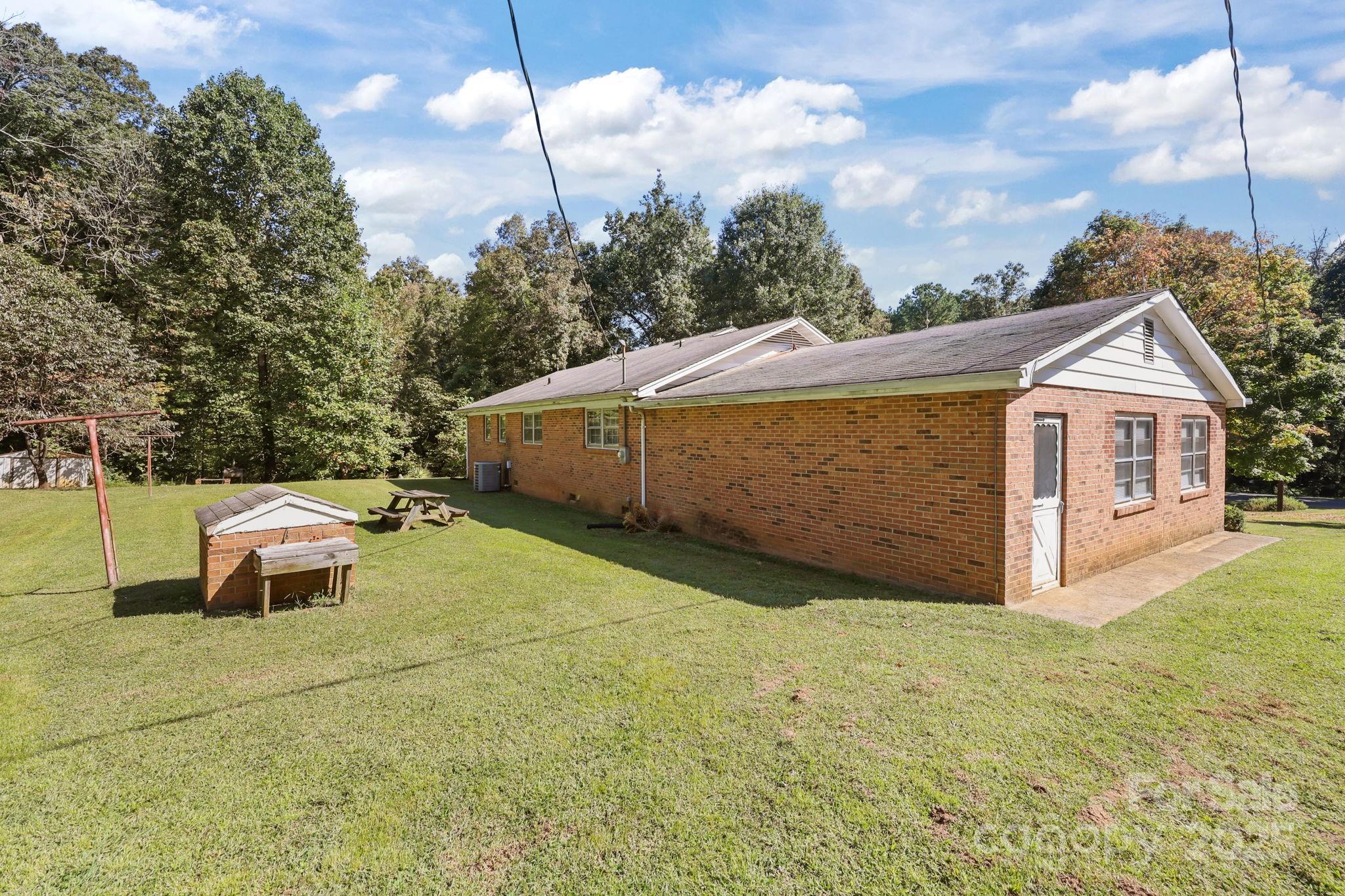 2440 Emanuel Church Road Rockwell, NC 28138 - Photo 33 of 41 a view of a backyard of the house