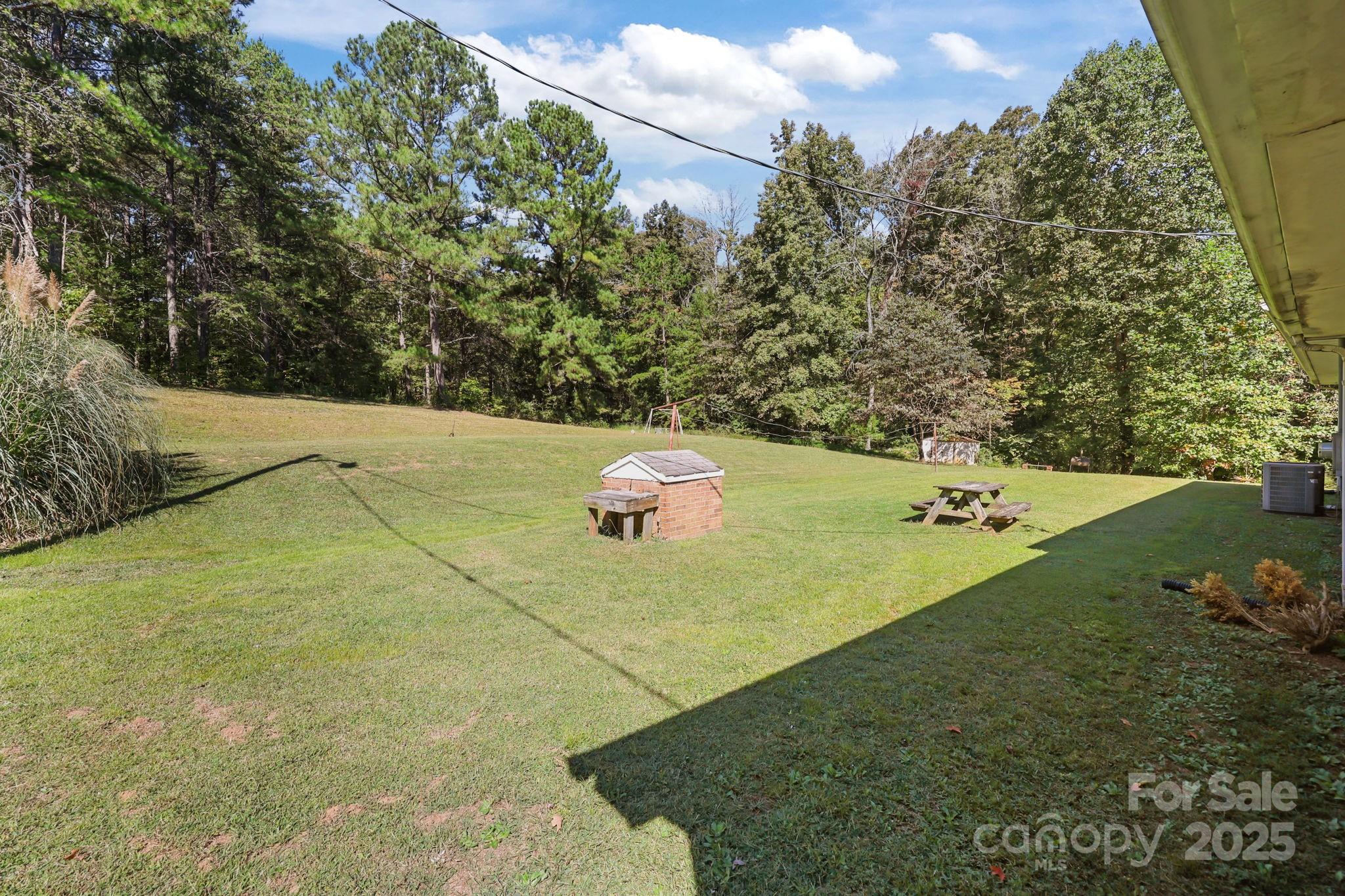 2440 Emanuel Church Road Rockwell, NC 28138 - Photo 34 of 41 a view of a yard