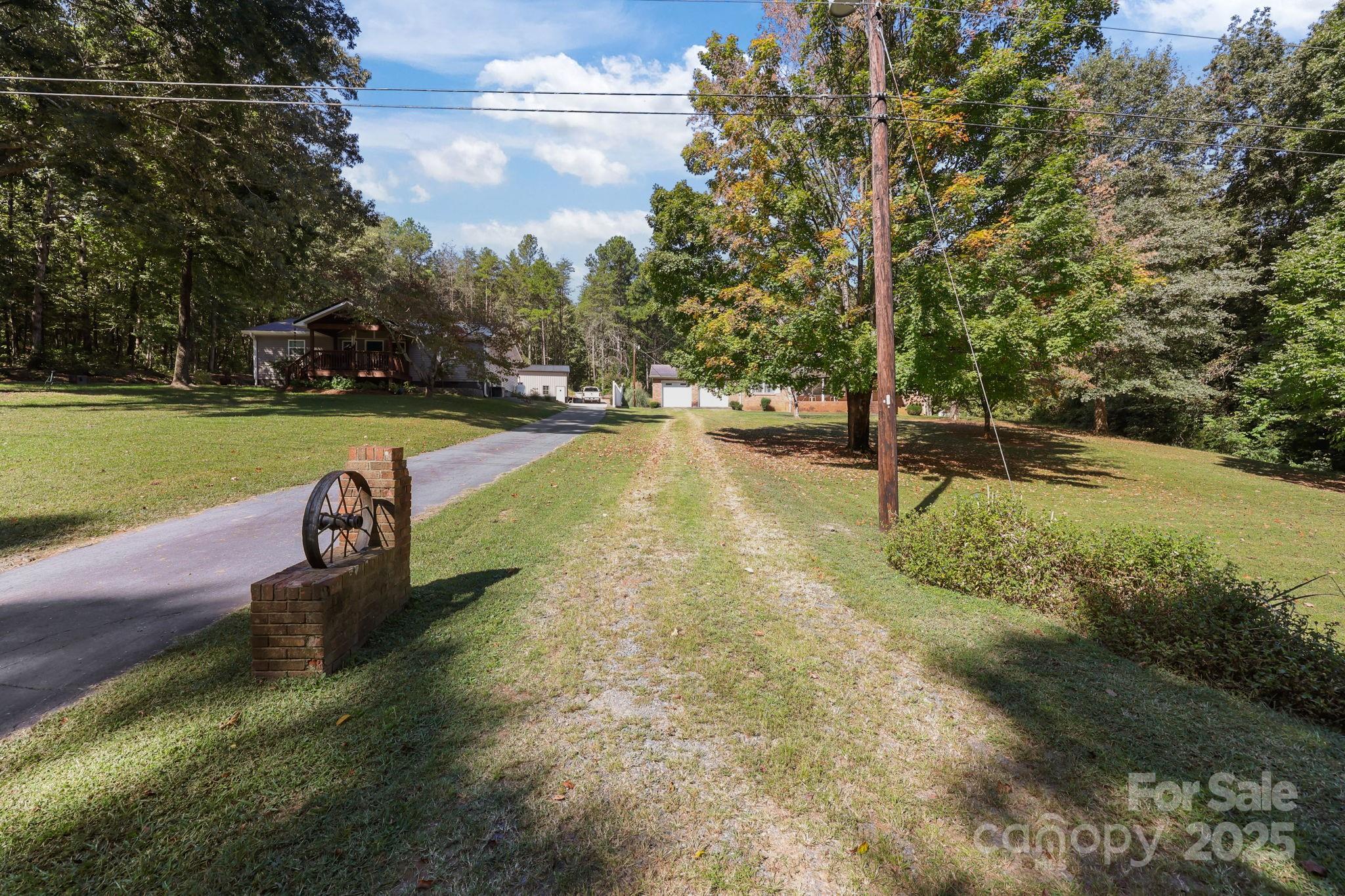 2440 Emanuel Church Road Rockwell, NC 28138 - Photo 36 of 41 a park view with a slide