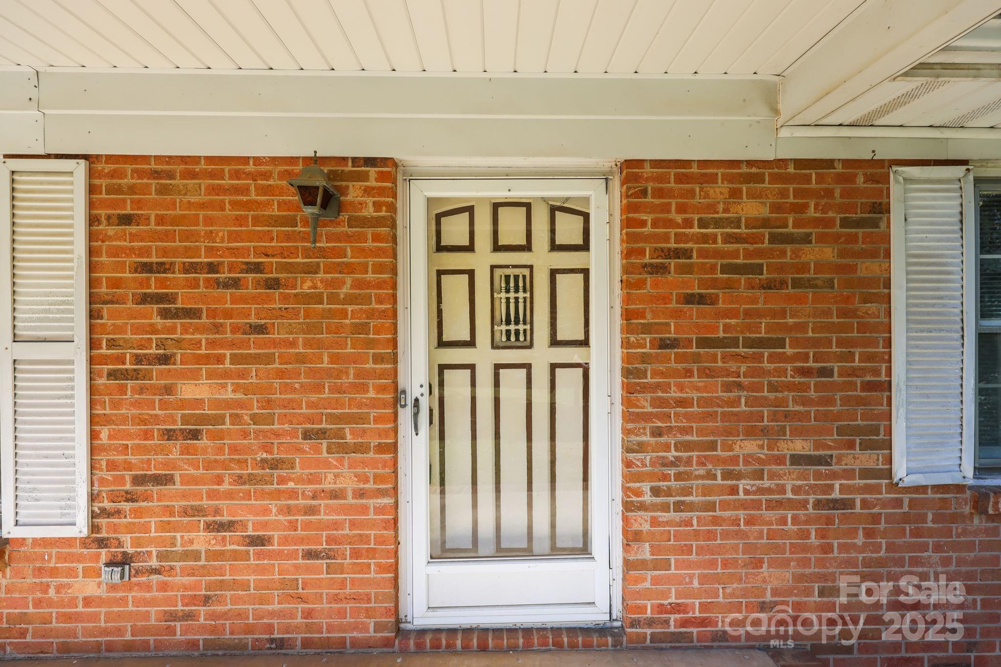 2440 Emanuel Church Road Rockwell, NC 28138 - Photo 6 of 41 a view of front door of house with stairs