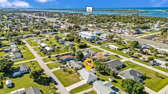 a view of a house with a big yard
