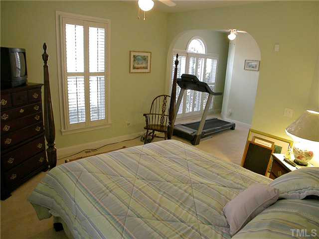 6812 Cool Pond Road Raleigh, NC 27613 - Photo 18 of 25 First Floor Bedroom has Adjacent Optional-use Room -- all have Plantation Shutters Bedroom