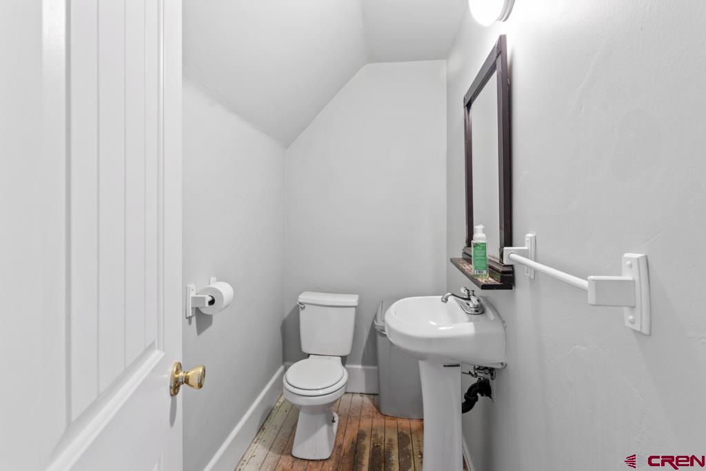 65536 Solar Road Montrose, CO 81403 - Photo 7 of 30 a bathroom with a sink toilet and a mirror