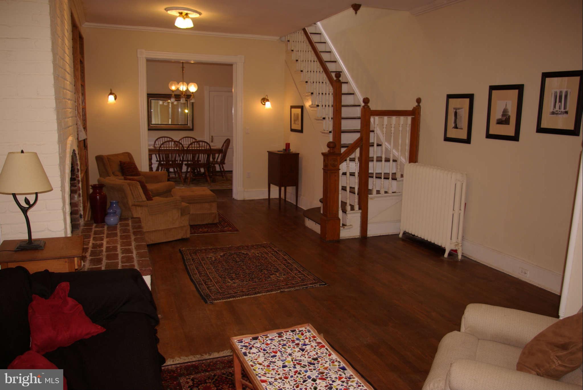 717 E Street Northeast Washington, DC 20002 - Photo 2 of 30 Living room from bay looking towards rear