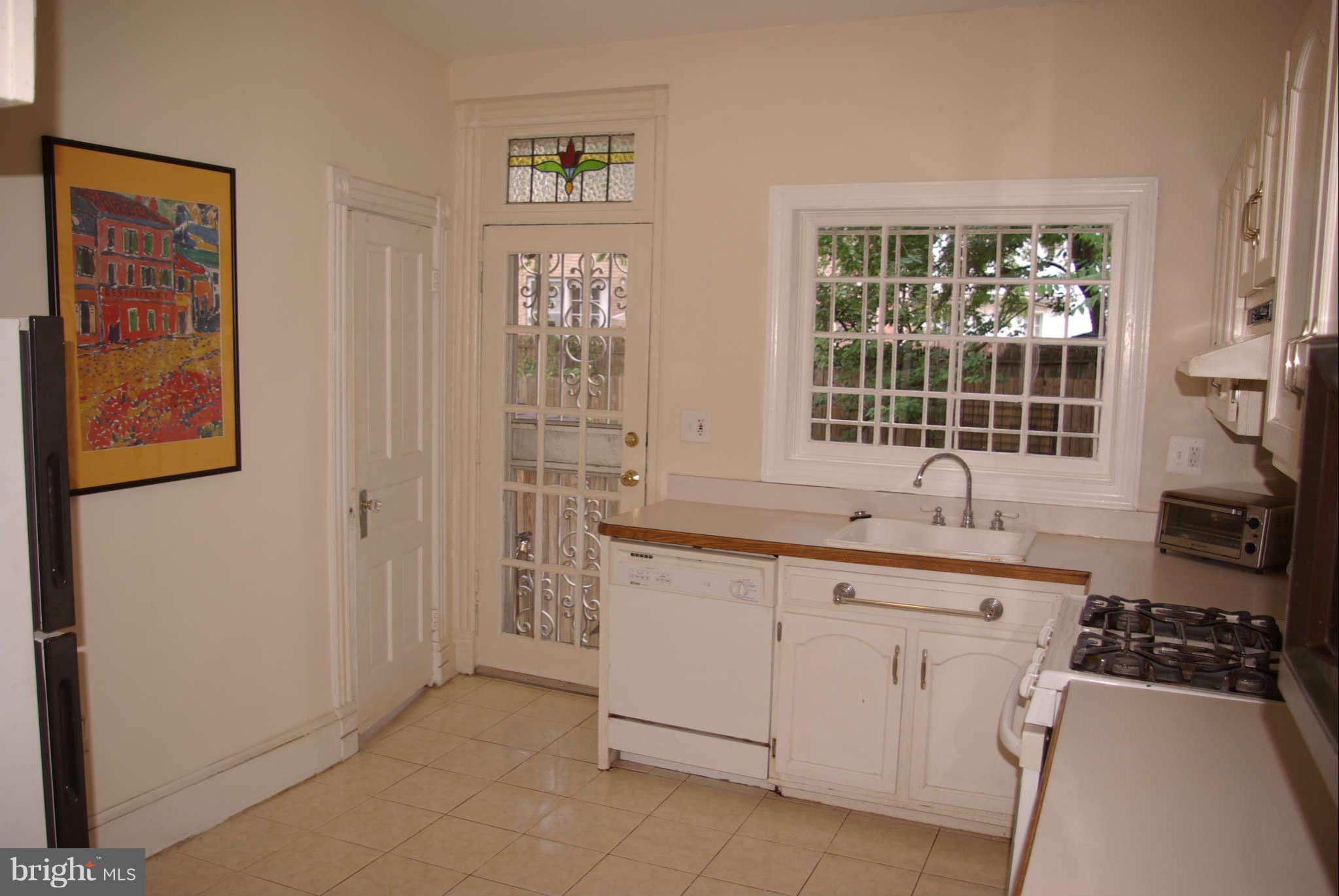 717 E Street Northeast Washington, DC 20002 - Photo 11 of 30 LARGE bright kitchen, pantry to left