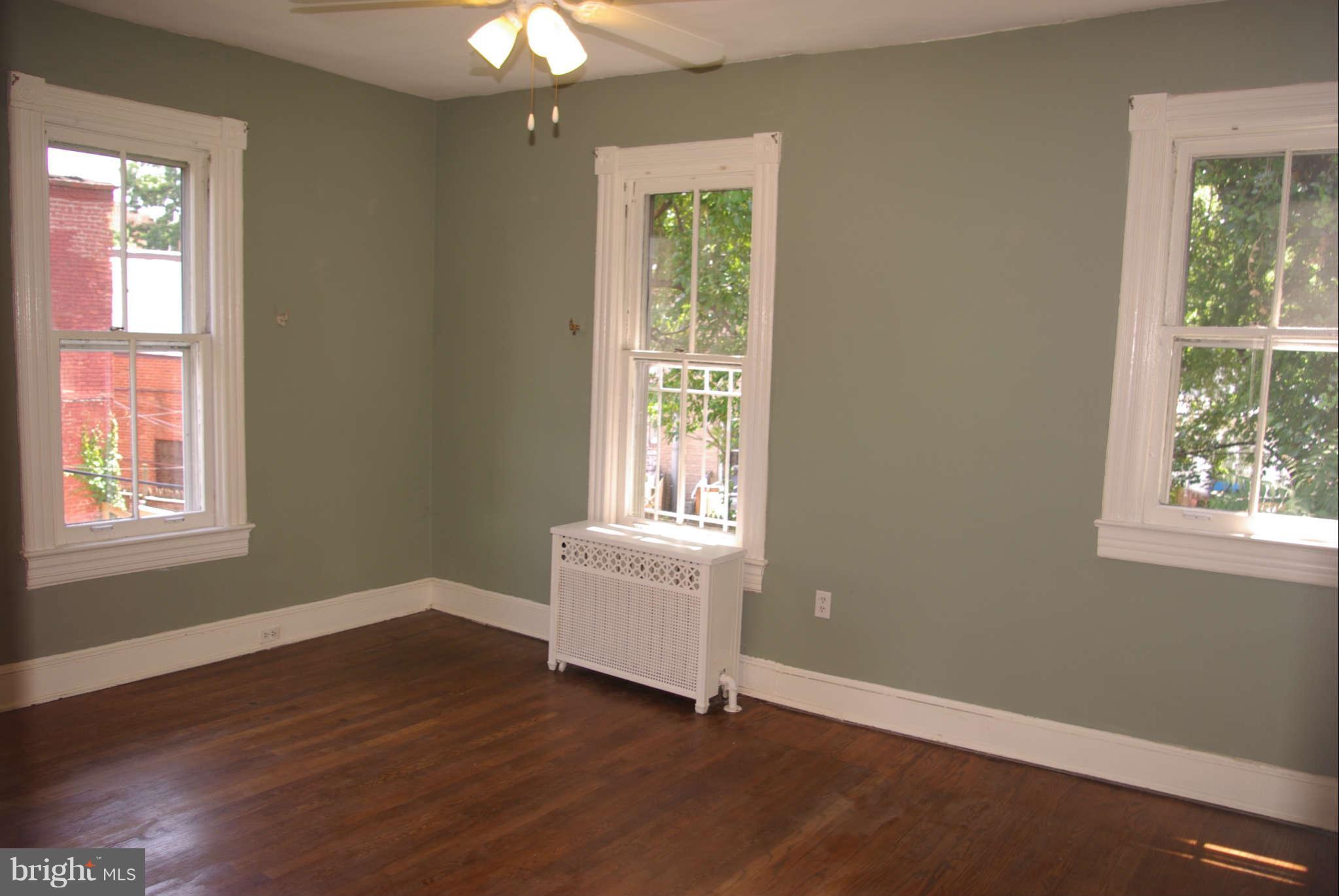 717 E Street Northeast Washington, DC 20002 - Photo 21 of 30 LARGE bright 3rd BR upstairs has 3 windows
