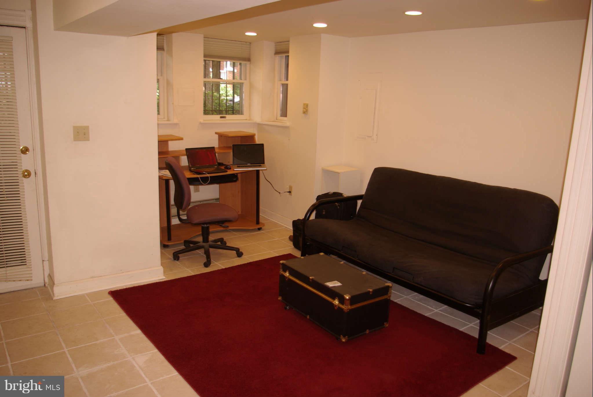 717 E Street Northeast Washington, DC 20002 - Photo 22 of 30 FLEXIBLE connecting basement family room