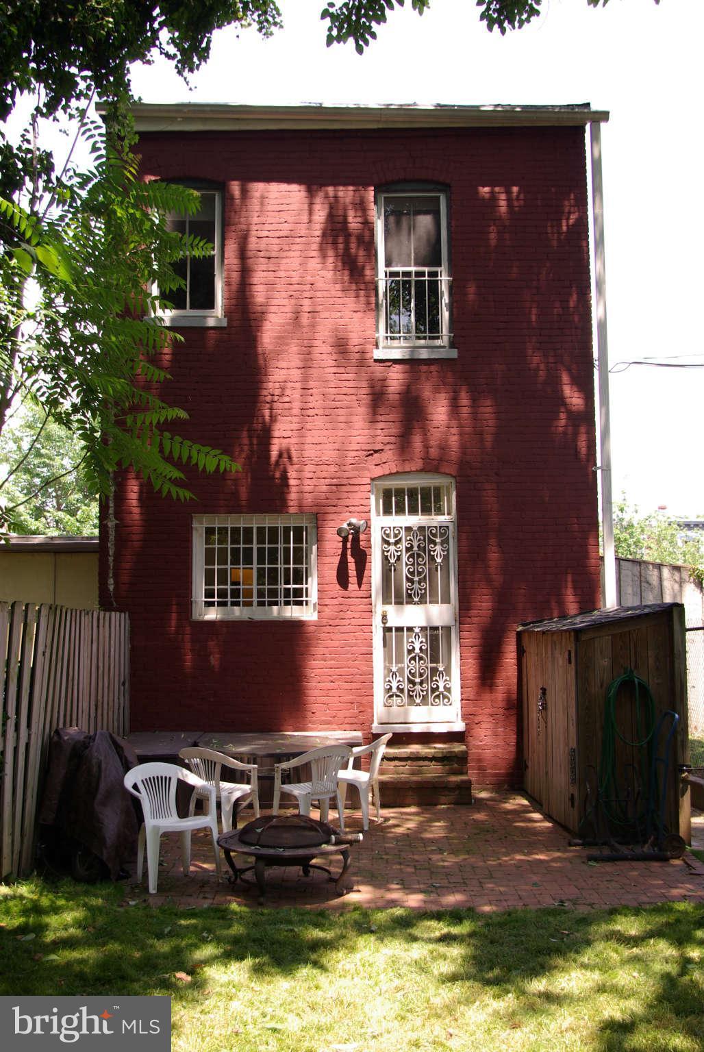 717 E Street Northeast Washington, DC 20002 - Photo 28 of 30 Rear of house showing patio and part of backyard