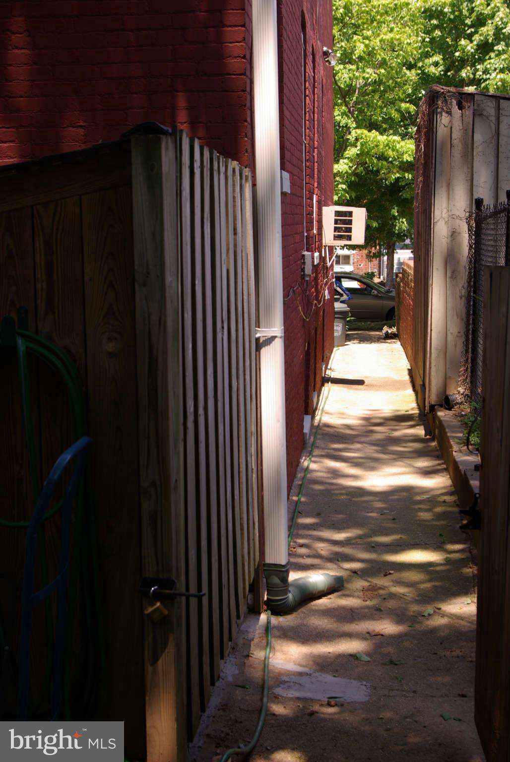 717 E Street Northeast Washington, DC 20002 - Photo 29 of 30 RARE side breezeway. Hello bikes and strollers