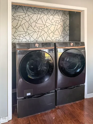 a utility room with dryer and washer