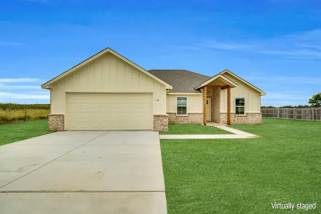 a view of outdoor space yard and garage
