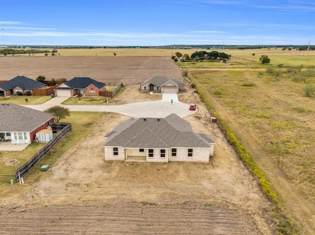 a view of a pool with an ocean view
