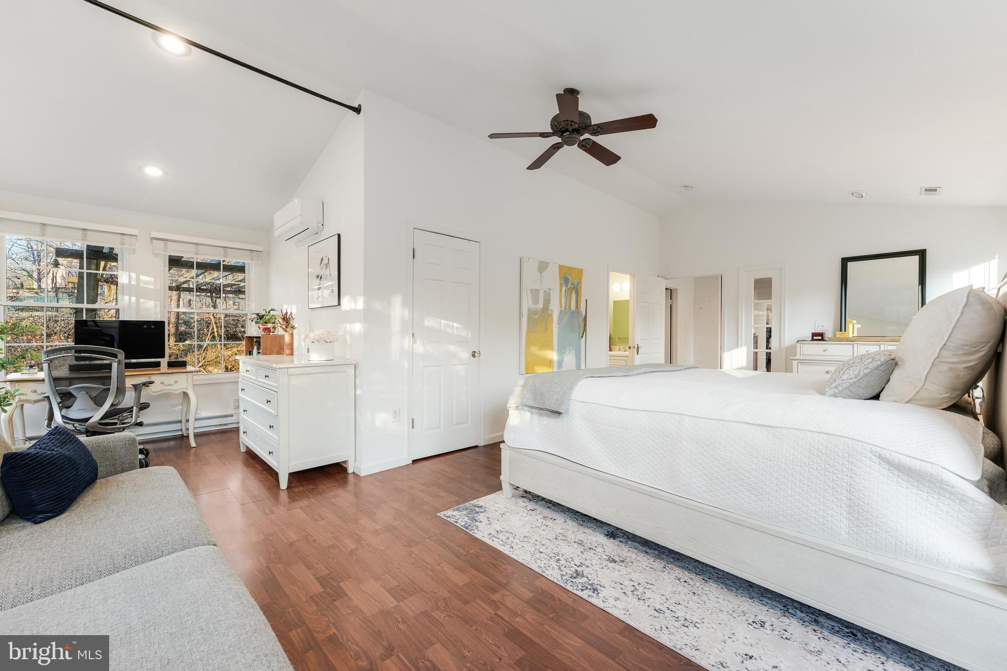 10808 Beach Mill Road Great Falls, VA 22066 - Photo 20 of 43 a large white bed in a white room