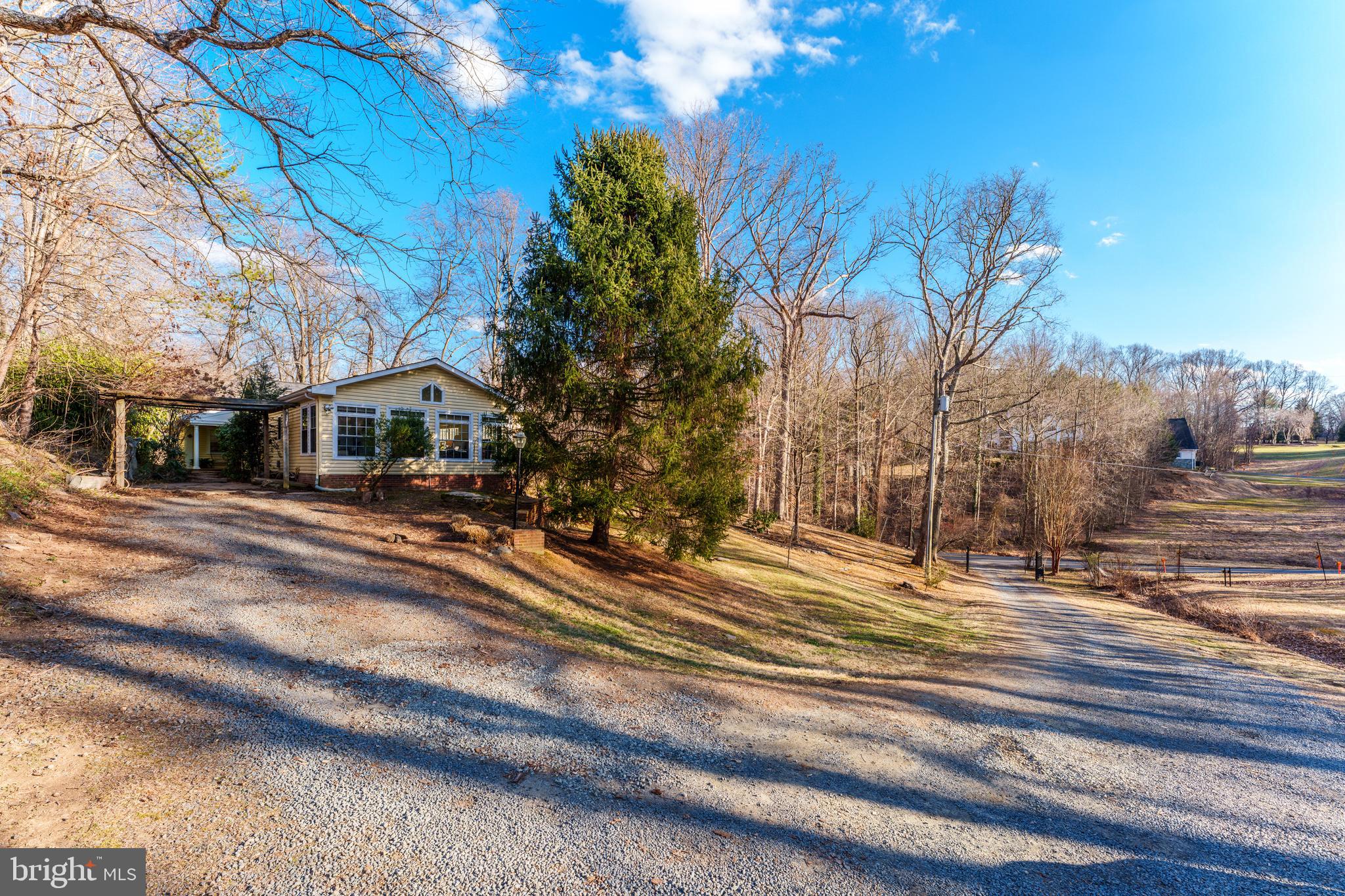 10808 Beach Mill Road Great Falls, VA 22066 - Photo 2 of 43 a view of city street with trees