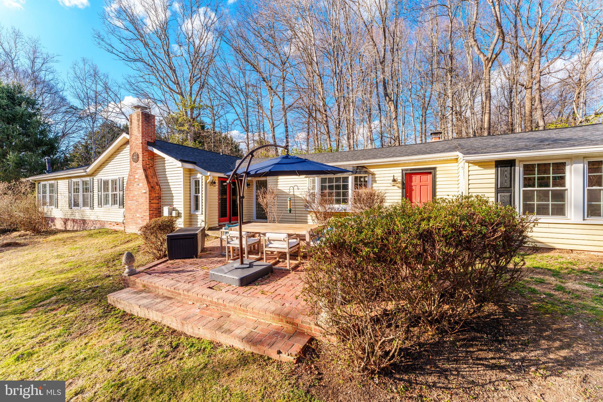 10808 Beach Mill Road Great Falls, VA 22066 - Photo 37 of 43 a front view of a house with patio