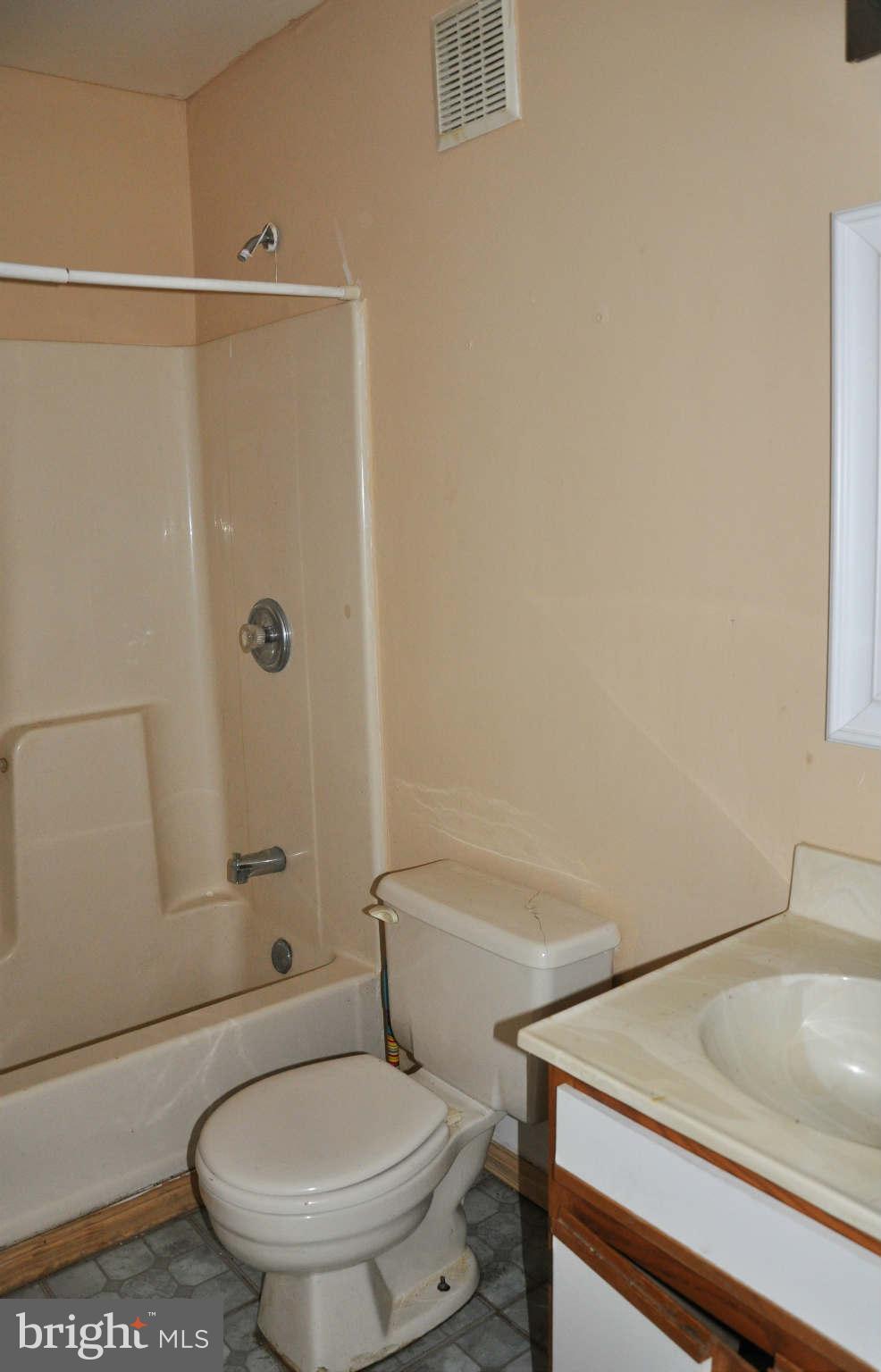 114 Timberlake Terrace, Unit 2 Stephens City, VA 22655 - Photo 18 of 22 a bathroom with a sink and toilet